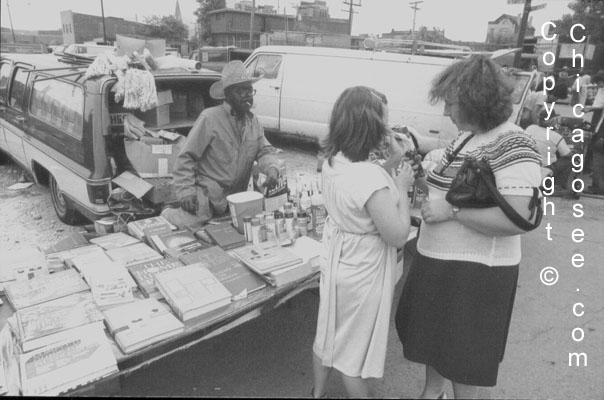 Women buying at Maxwell Street, Chicago